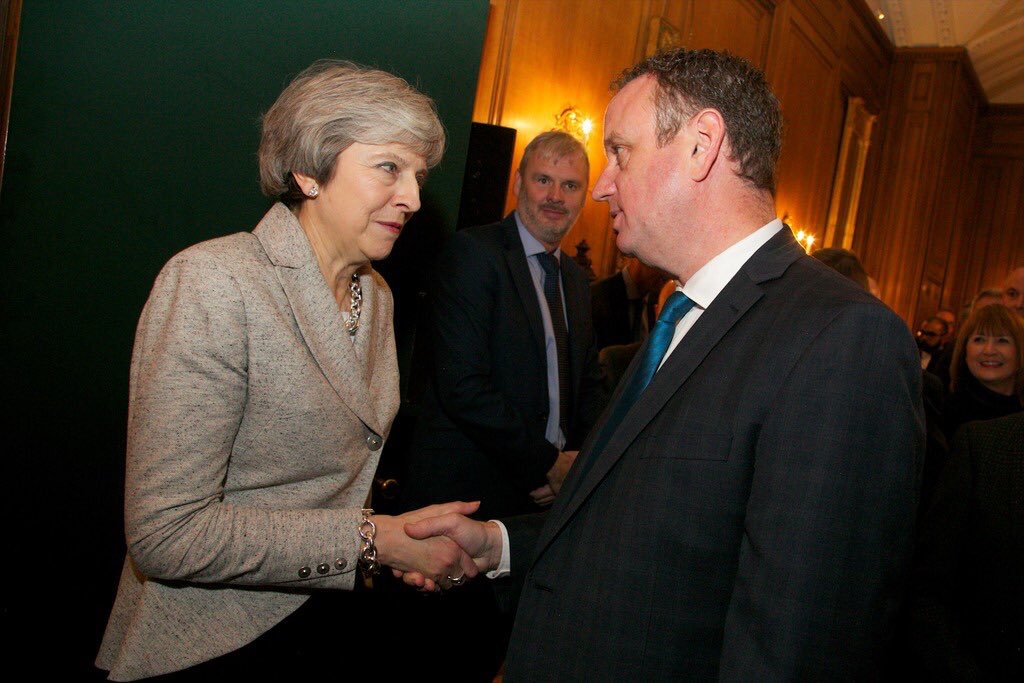 elly meets with Theresa May in the early stages of Brexit negotiations. His company was heavily involved in the deliberations for the Northern Irish Brexit protocol. 